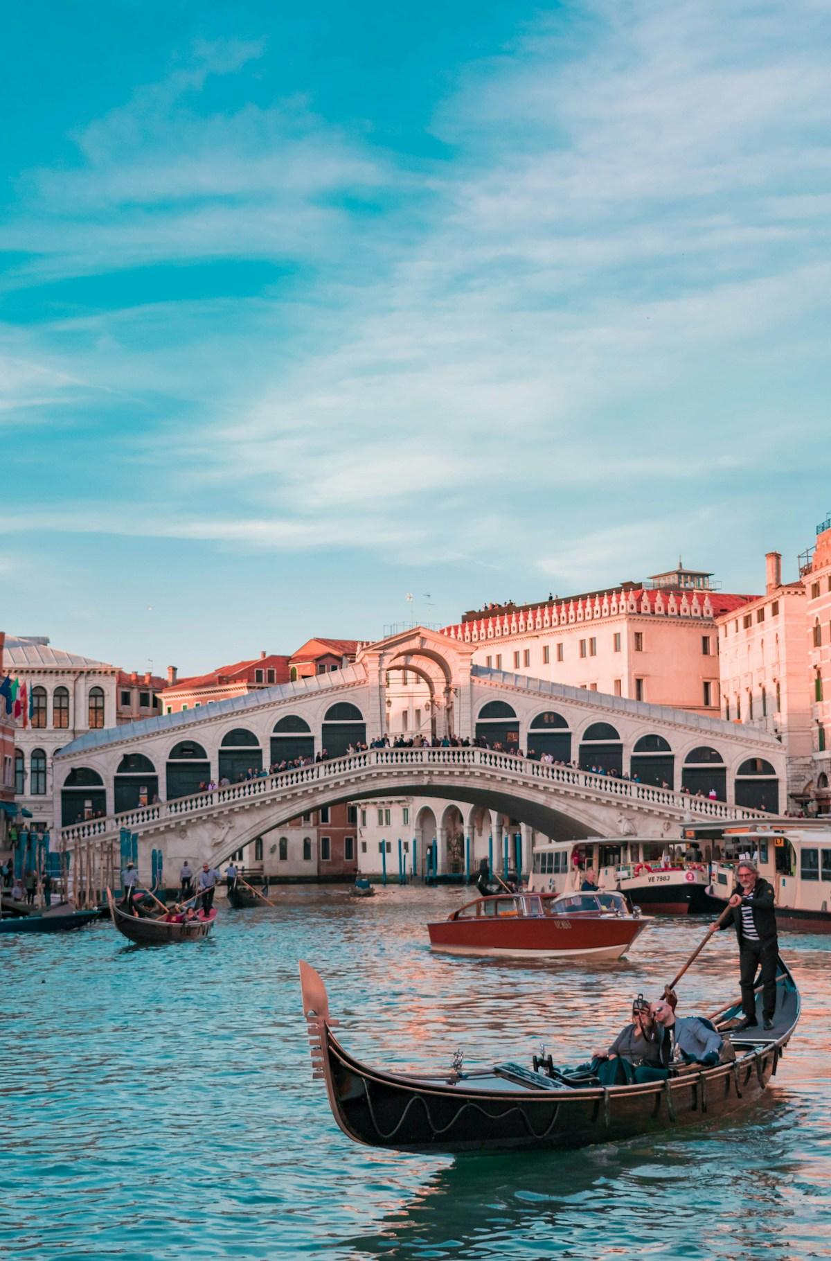 Venice canal with colourful buildings representing student life in Italy