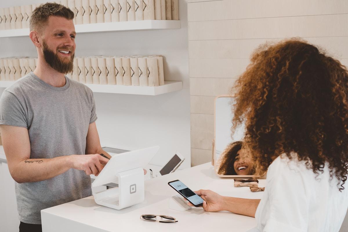Student using a debit card at an ATM abroad representing international banking for Indian students