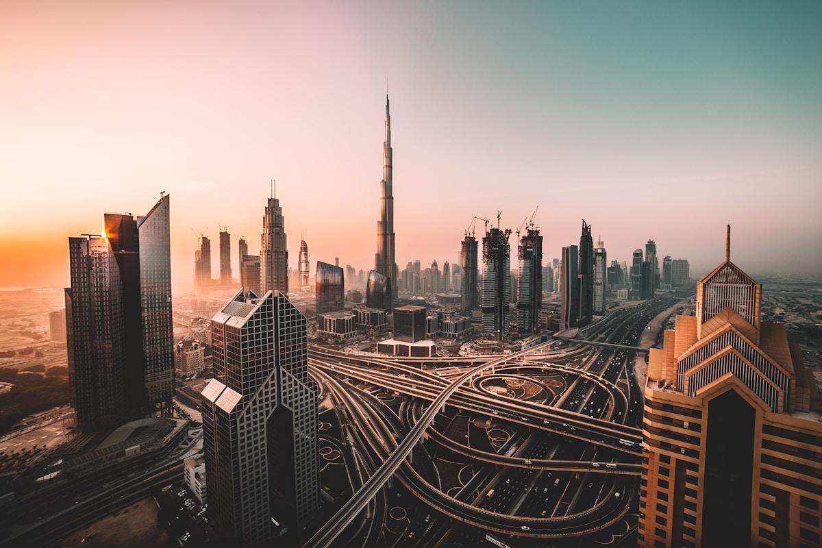 Dubai skyline with modern university buildings and Burj Khalifa in the background