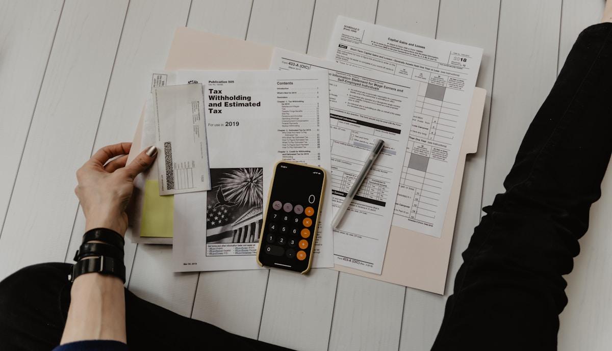Calculator and financial documents for study abroad cost planning