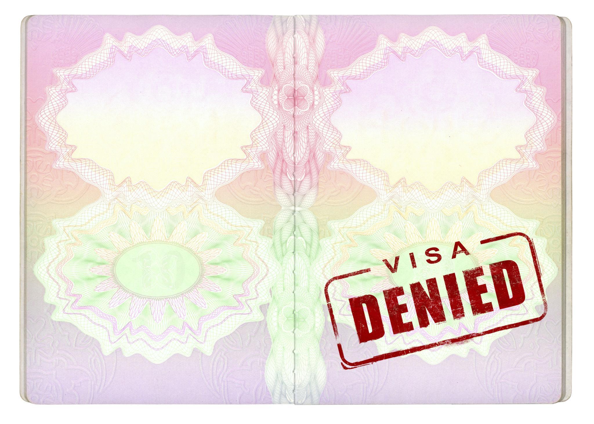 Student Visa Rejection - passport with denied stamp